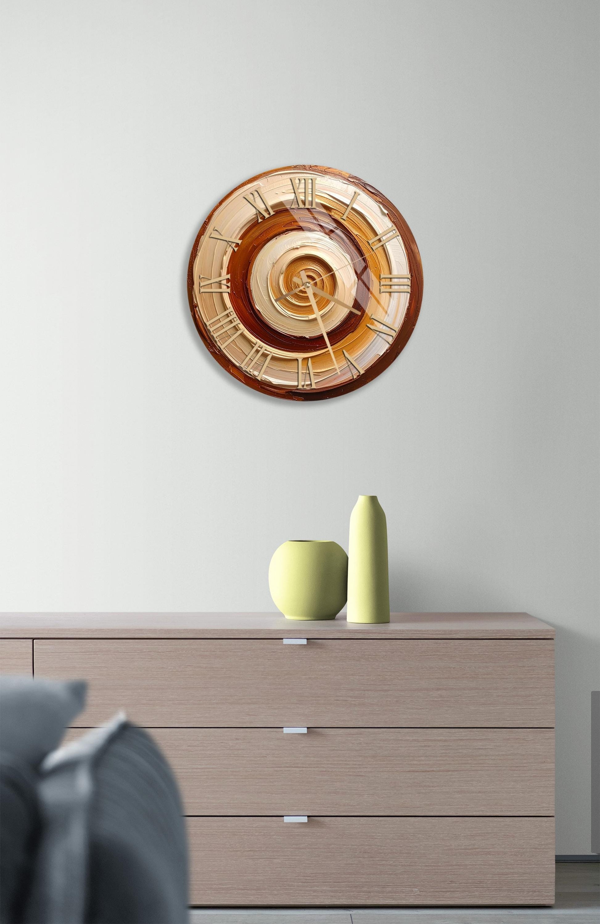 a modern living room with a wooden dresser, a decorative clock, and a vase on top of the dresser.