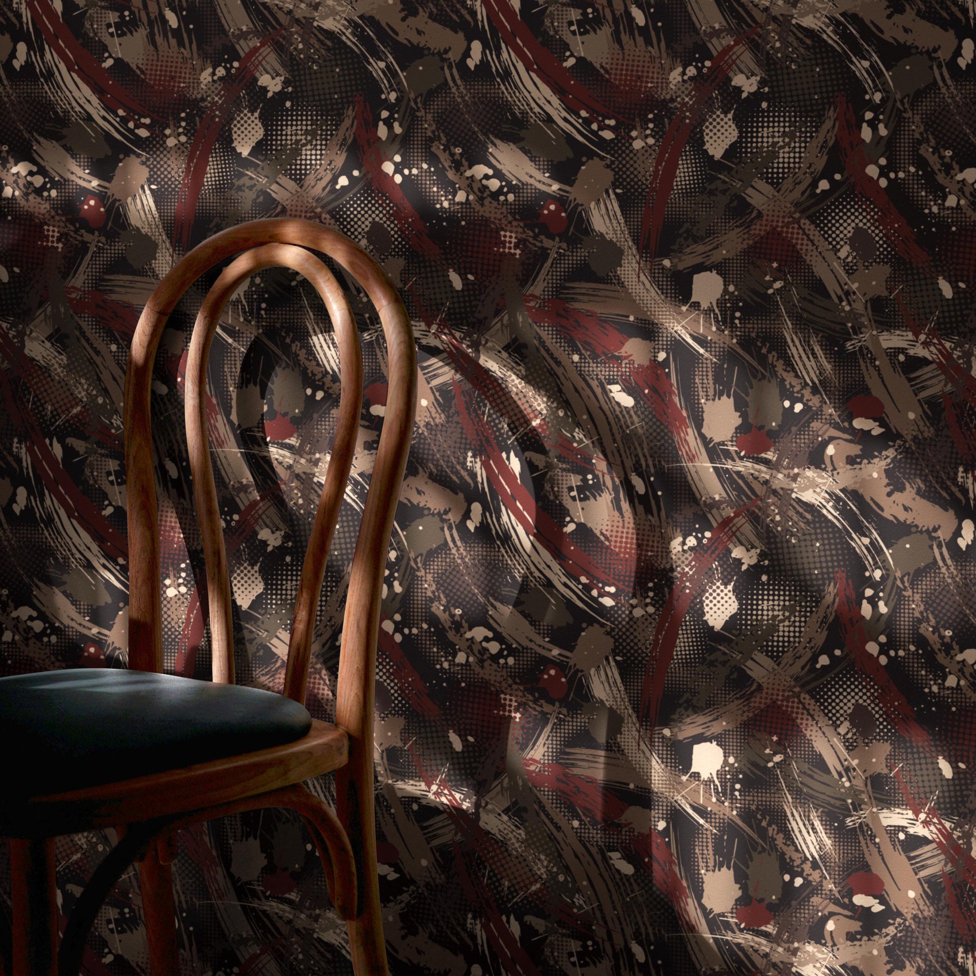 a wooden chair with a black seat against a wall with a colorful abstract pattern.