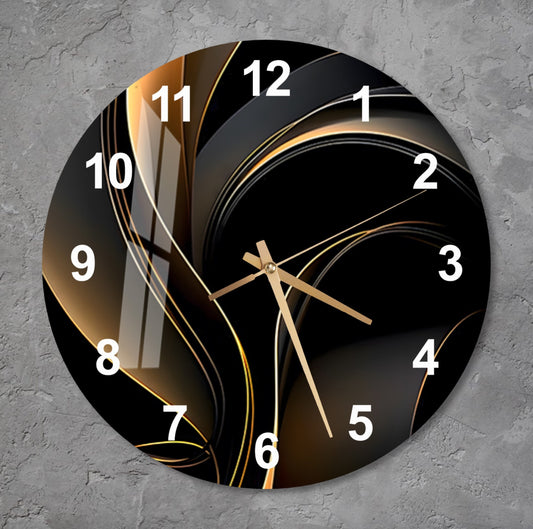 a black and gold clock on a gray wall
