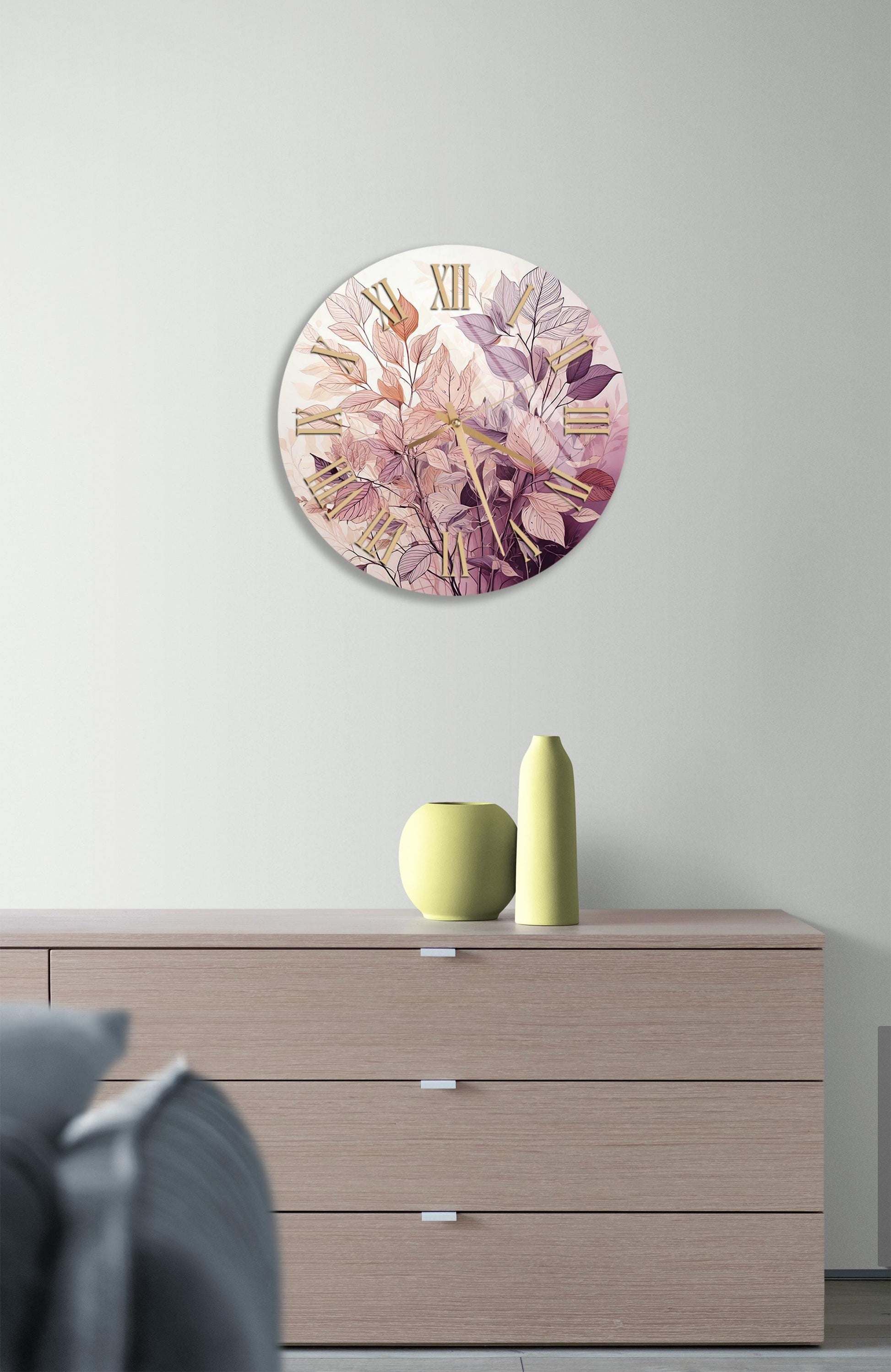 a clock on a wall above a dresser