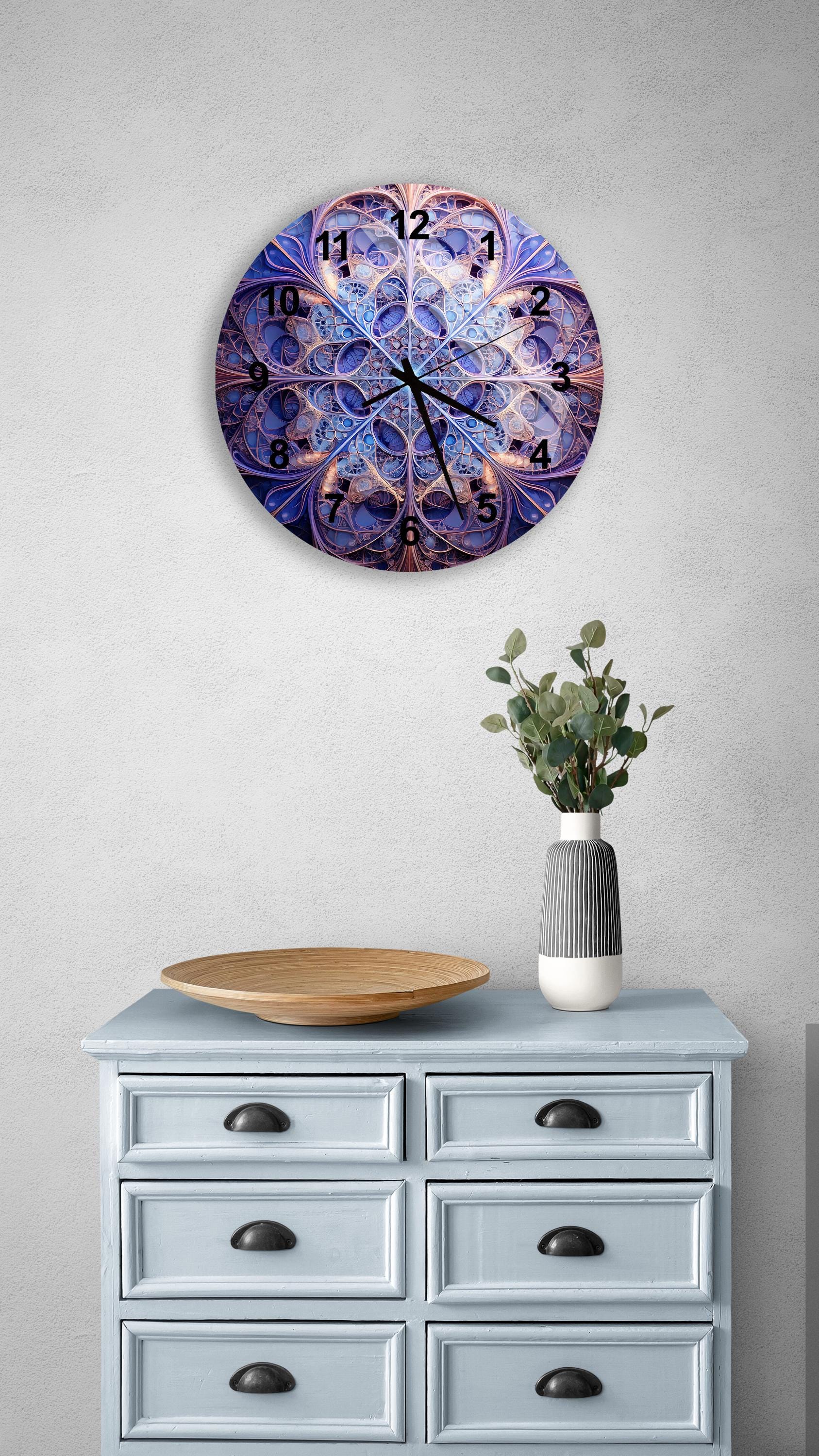 a clock on a wall above a dresser