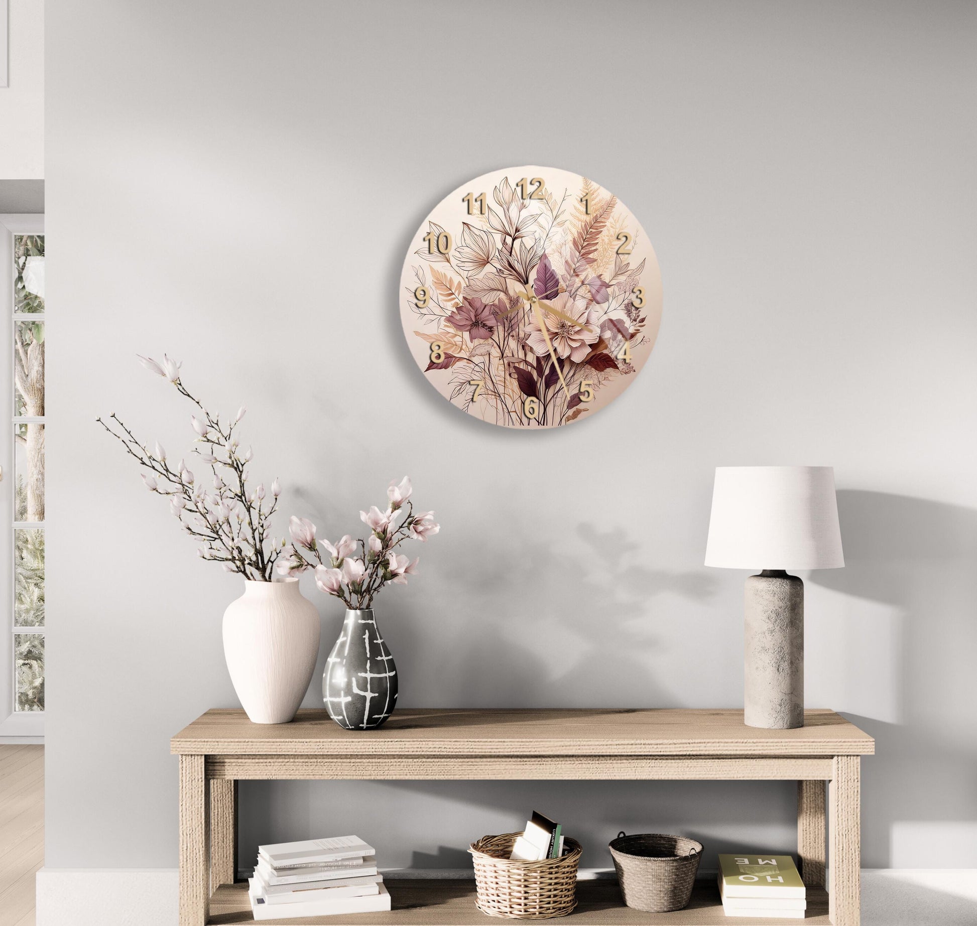 a table with a vase of flowers and a clock on the wall