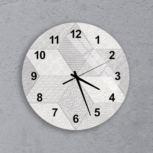 A wall clock with a unique design, featuring a combination of geometric shapes and patterns.