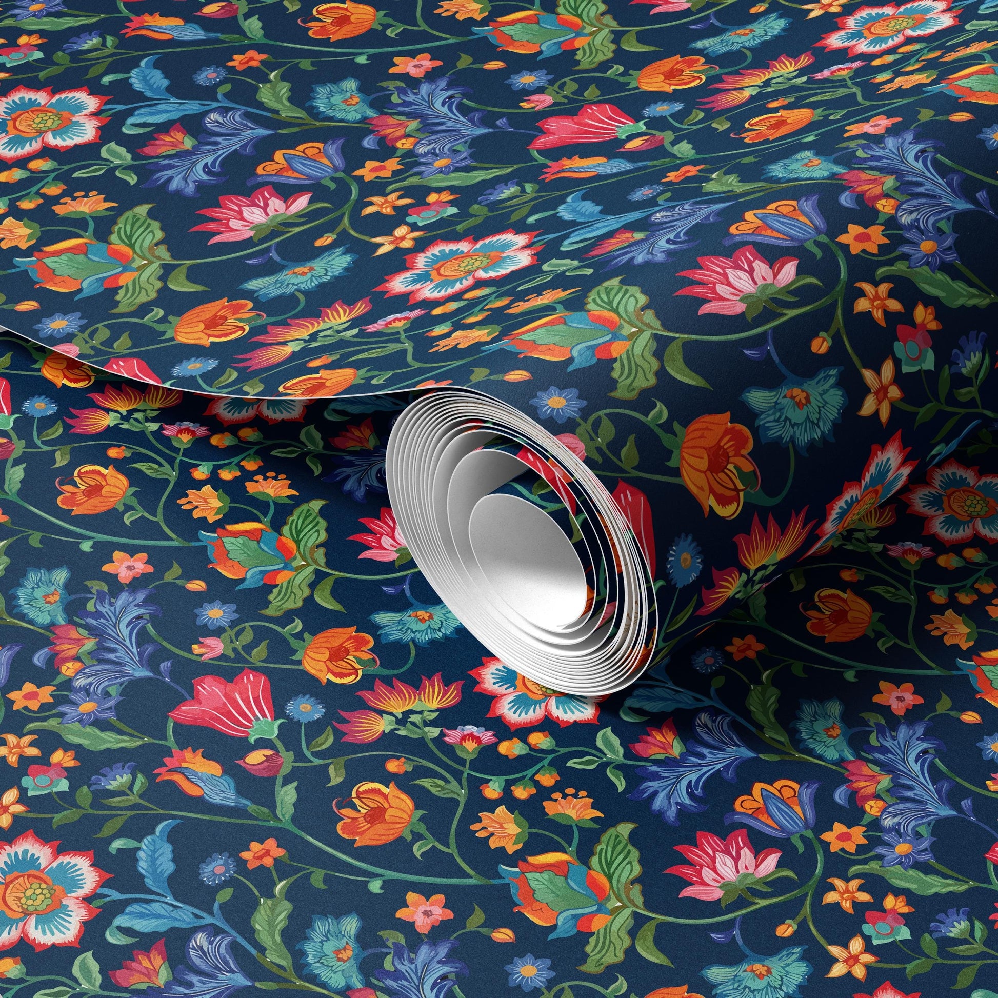 a roll of wallpaper with a vibrant floral pattern in shades of blue, orange, and pink.