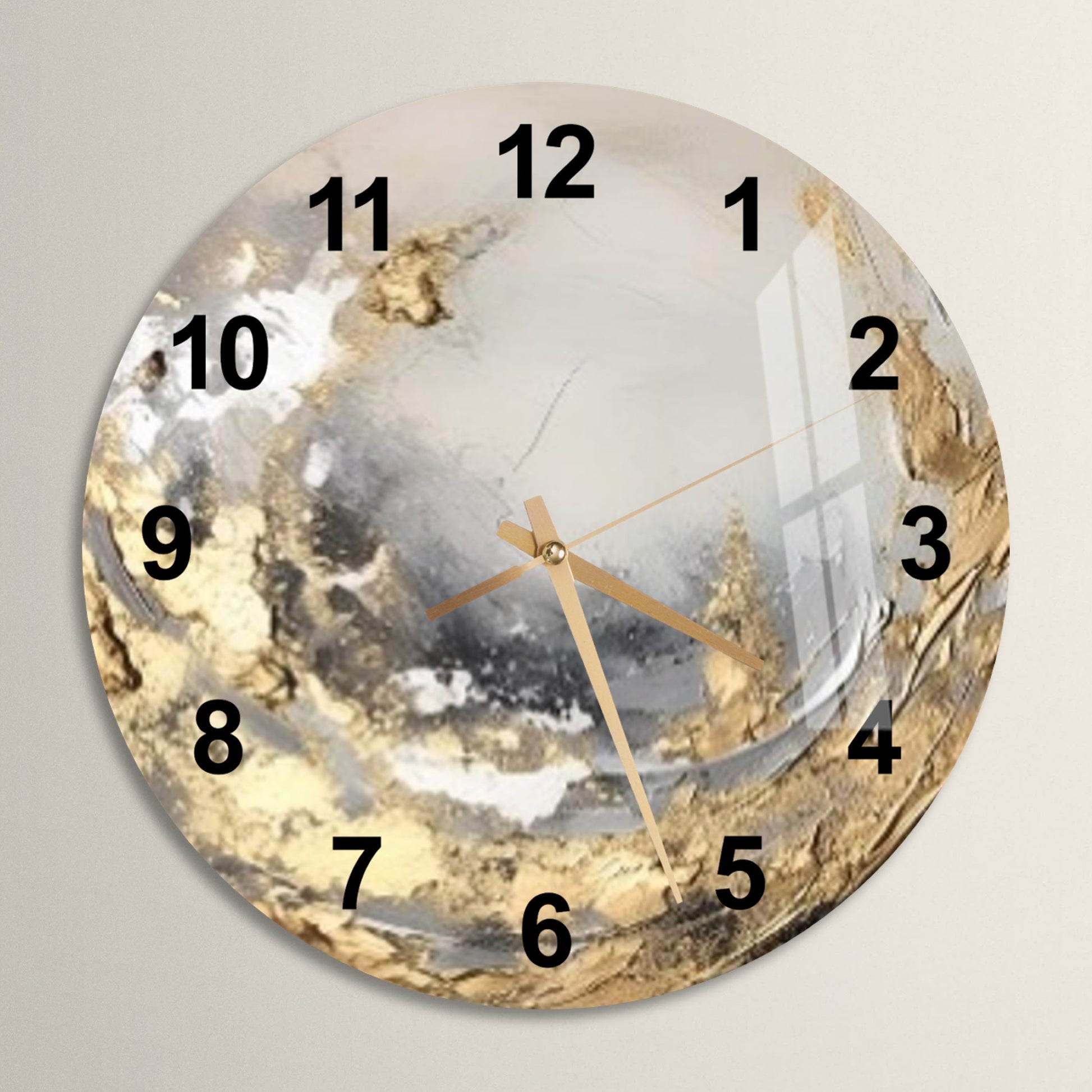 a clock with a gold and silver design on it