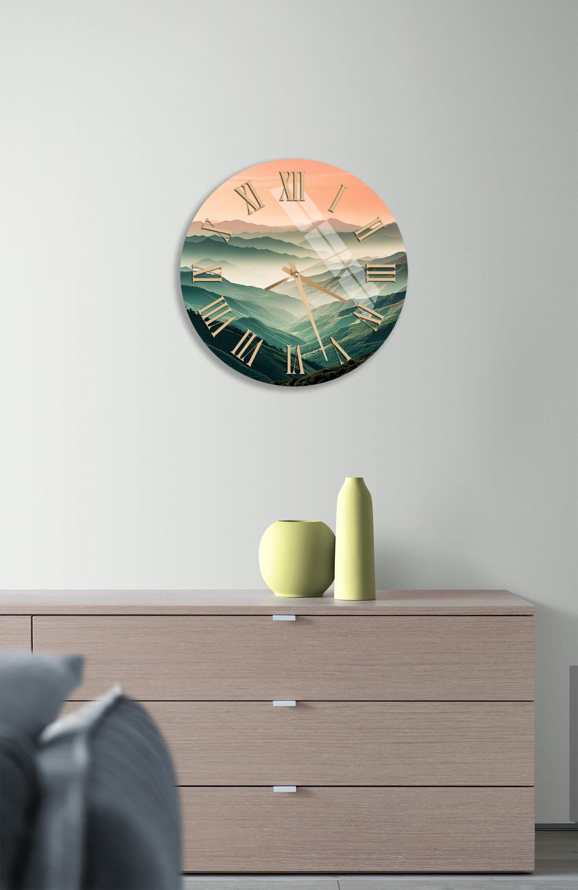 a clock on a wall above a dresser