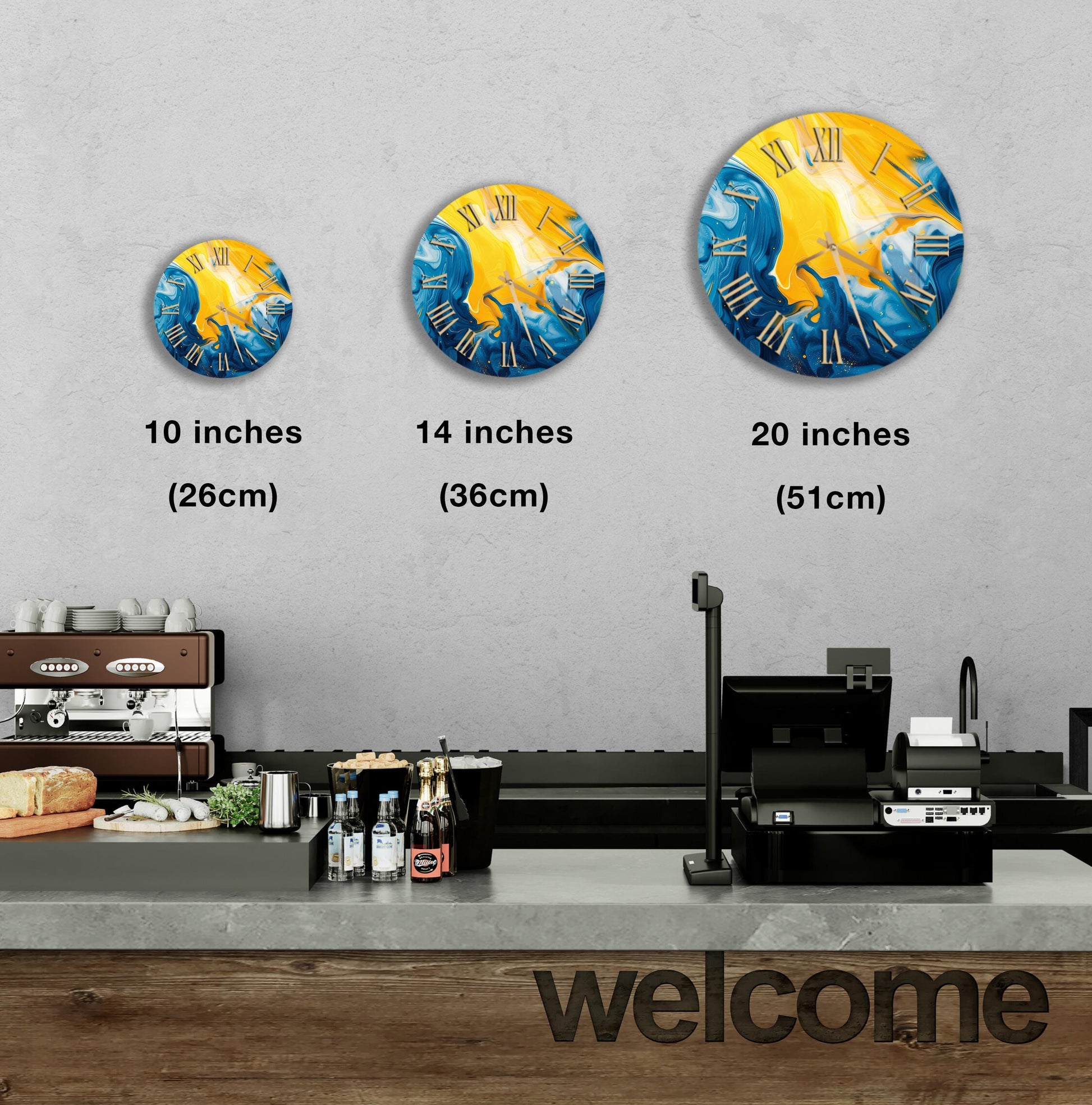 a counter in a restaurant with a welcome sign, and there are three clock images of different sizes displayed on the wall above the counter.