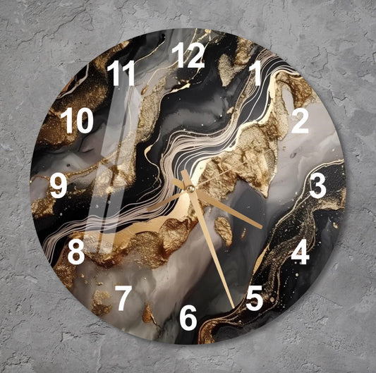 a clock with a black and gold design on it