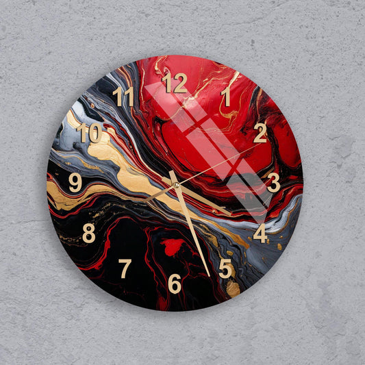 a clock with a red and black design on it