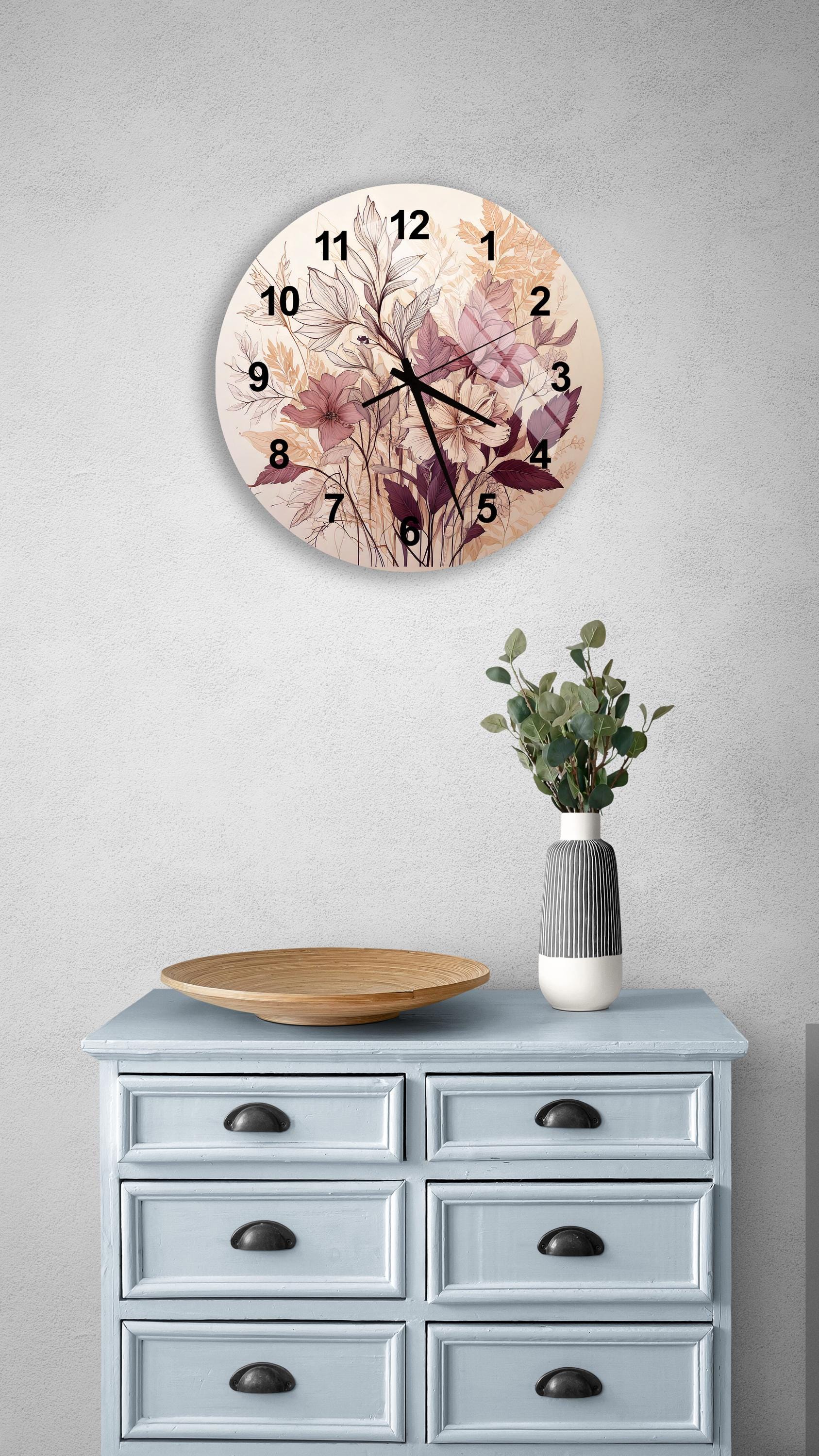 a clock on a wall above a dresser