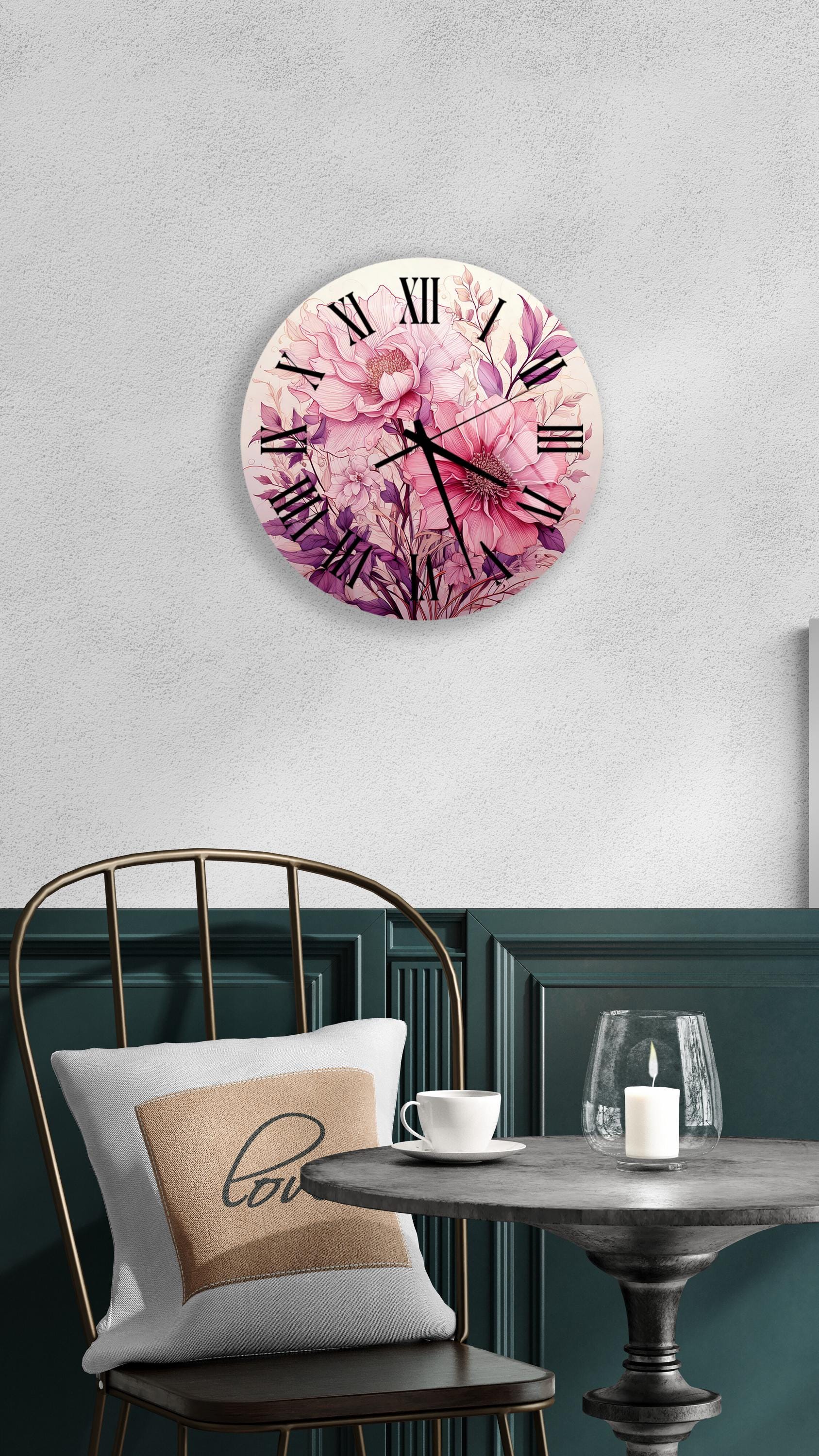 a clock with pink flowers on the face of it