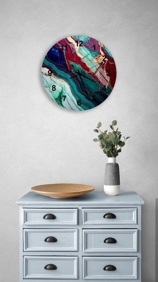 a blue dresser with a vase and a clock on it