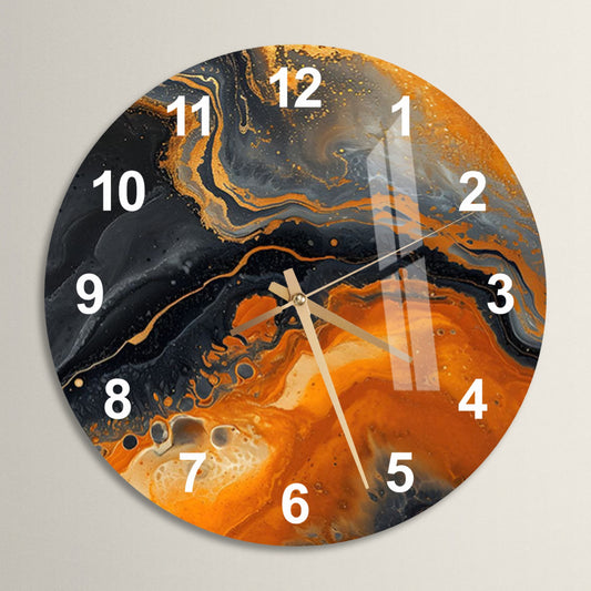 a clock with an orange and black design on it