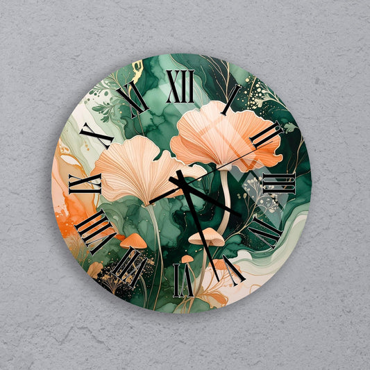 A round wall clock with a floral design featuring orange and green flowers against a dark green background.