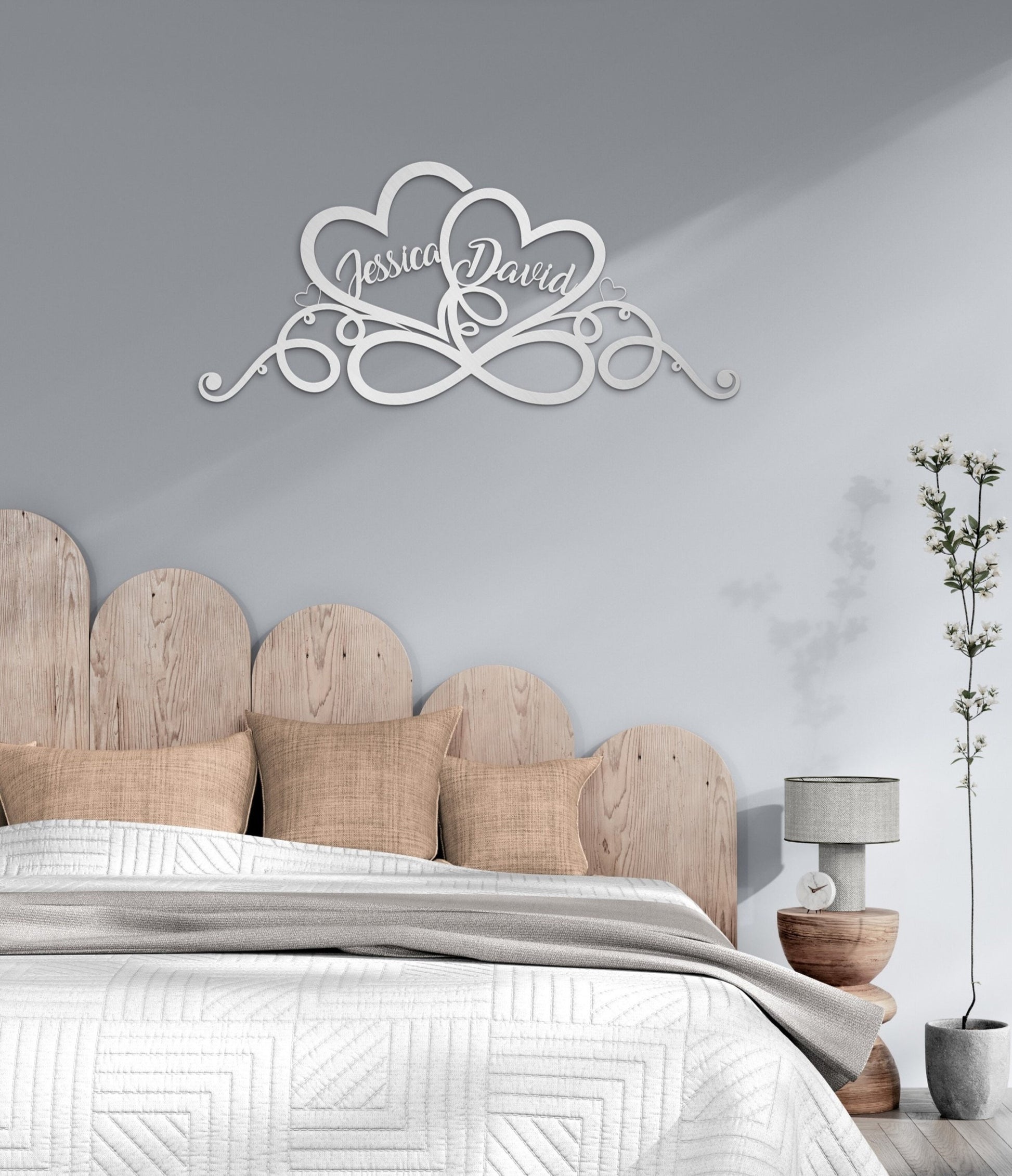 a bed with a white headboard and a wooden head board