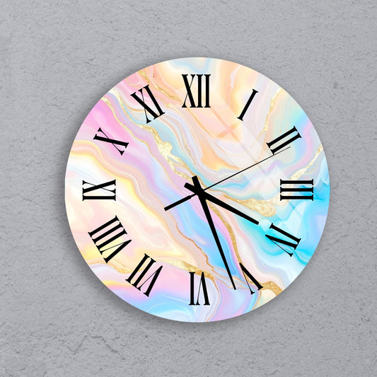 A round wall clock with a marble-like design featuring a combination of pink, blue, and yellow colors.