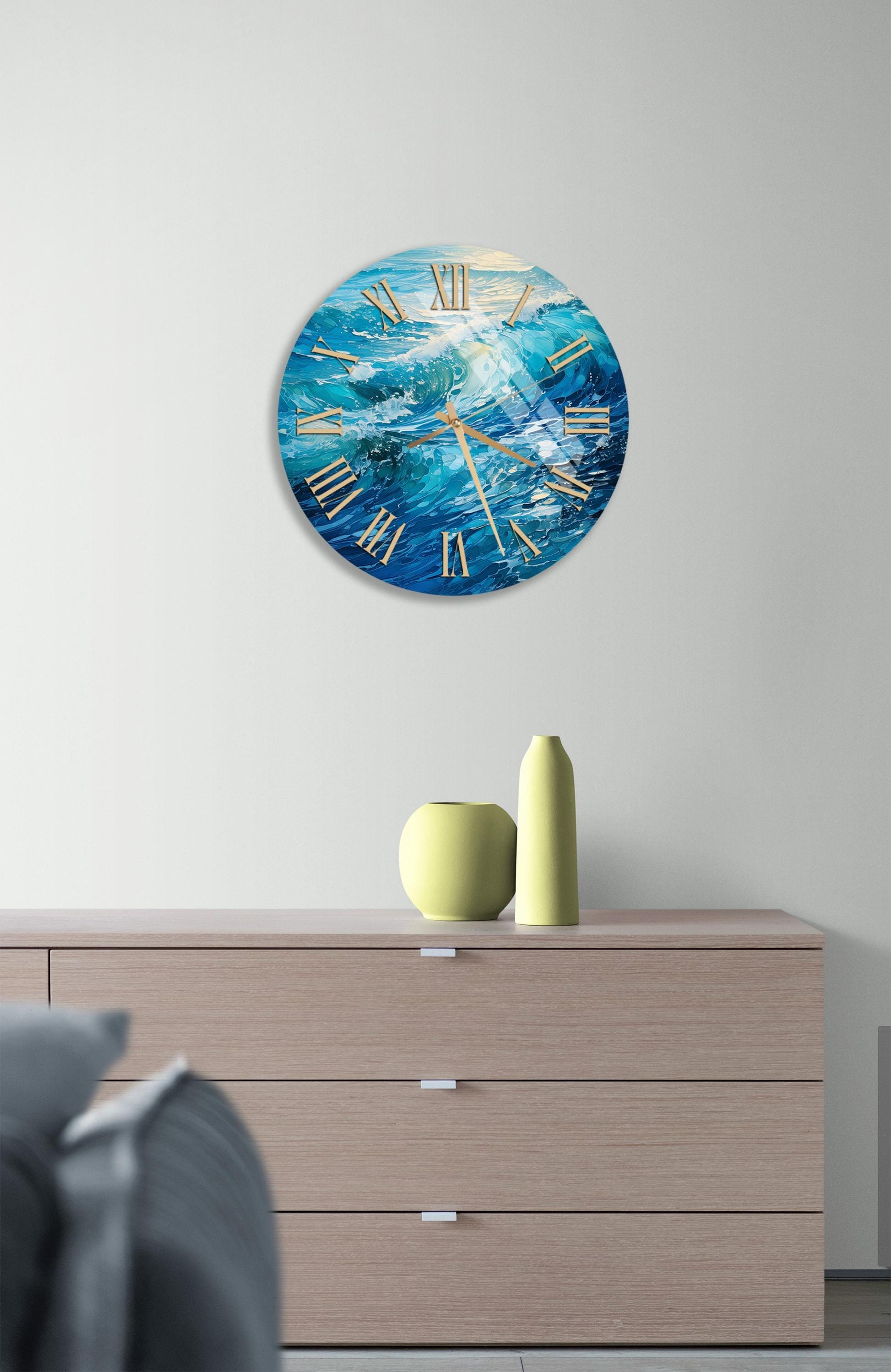a clock on a wall above a dresser