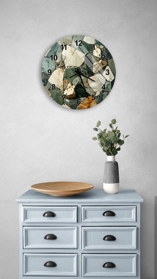 a wall clock with a mosaic design, a wooden tray, a vase with greenery, and a light blue dresser with six drawers.
