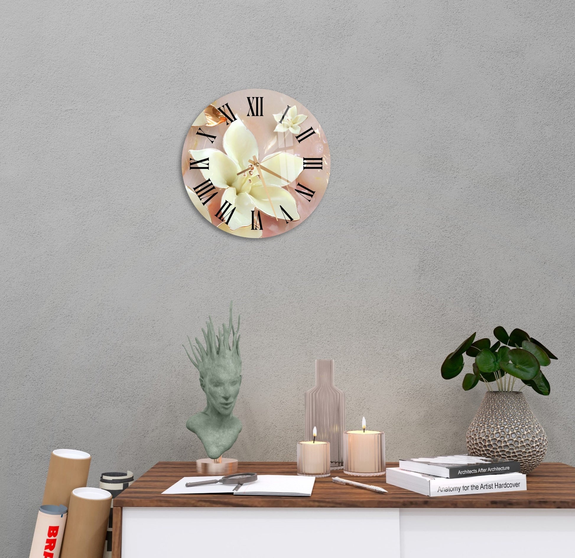 a clock on a wall with flowers and candles