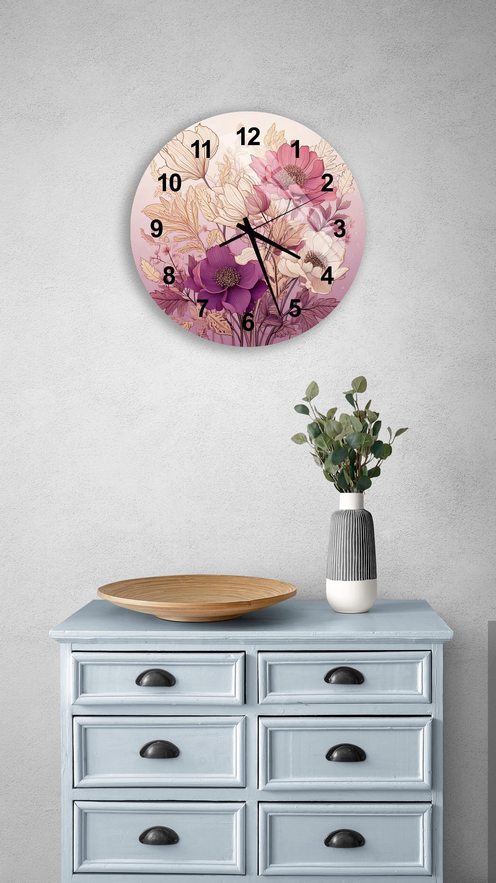 a clock on a wall above a dresser