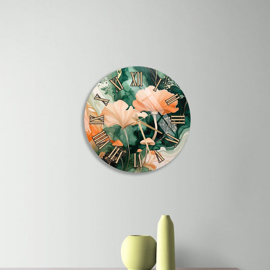 a round clock with a floral design hanging on a wall above a wooden dresser with three drawers.