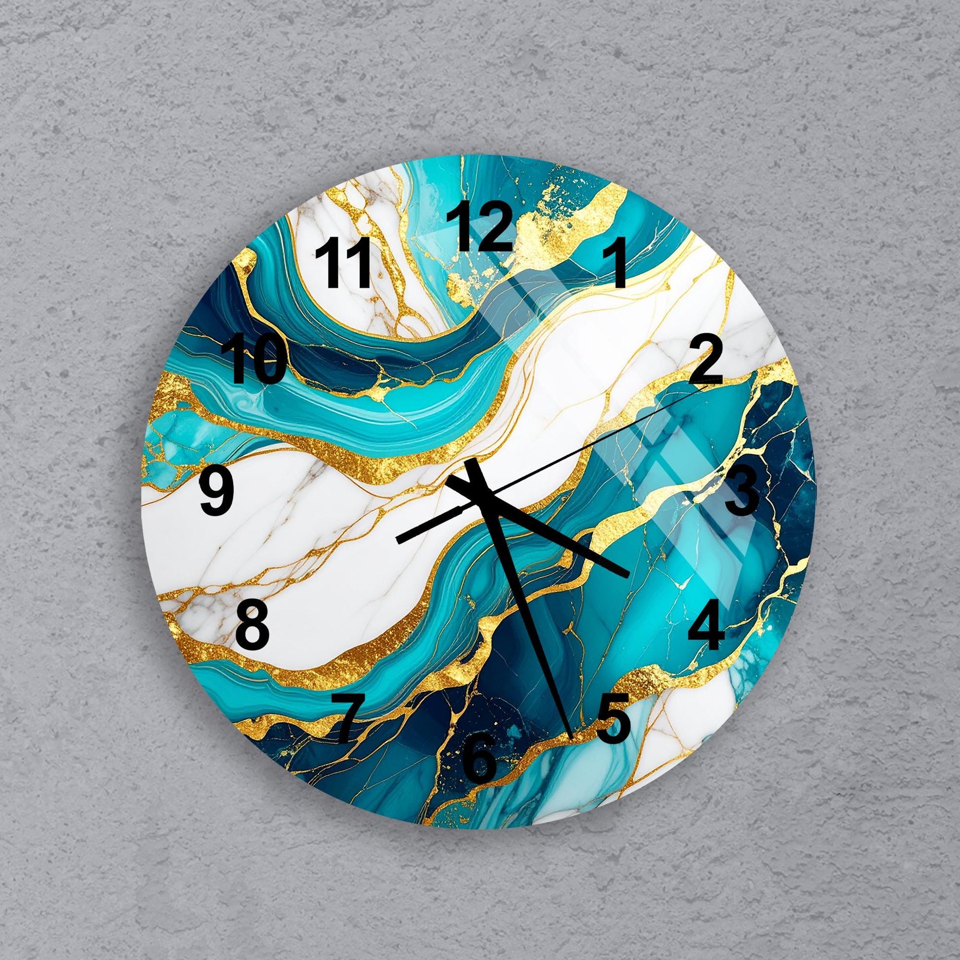 A round wall clock with a marble-like design in shades of blue, white, and gold.