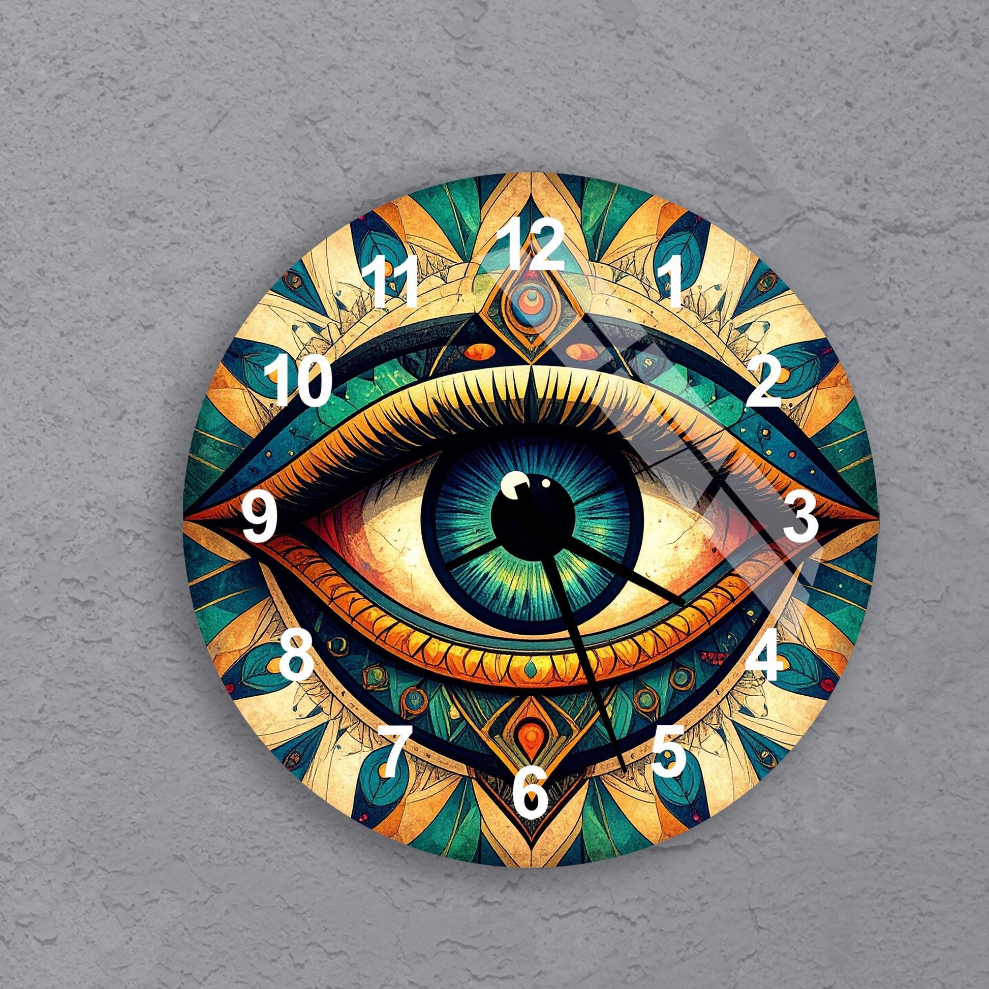 A colorful clock with an eye design on its face.