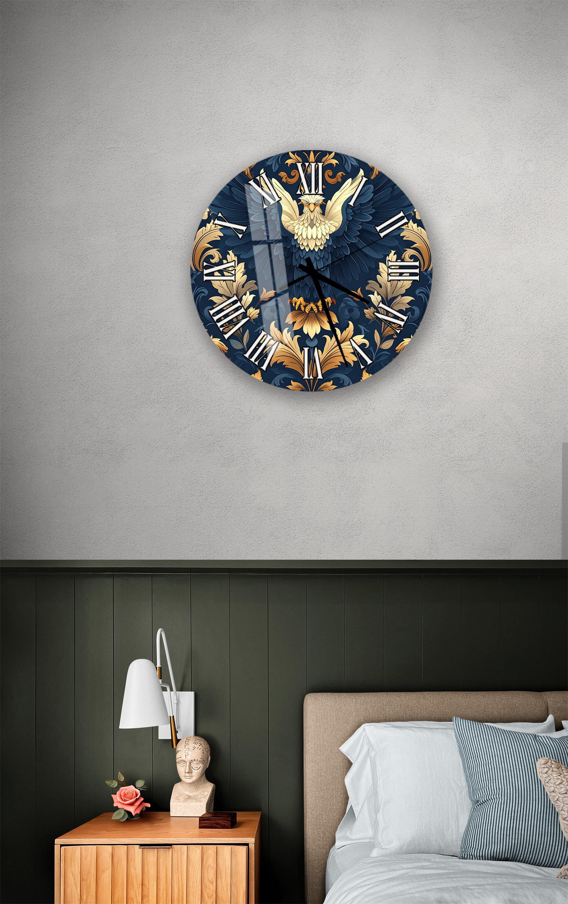 a bedroom setting with a large, ornate wall clock as the focal point. The clock has a blue and gold design with a bird motif, and it is mounted on a wall above a bed with a wooden headboard. The room also includes a nightstand with a lamp and a small statue or bust.