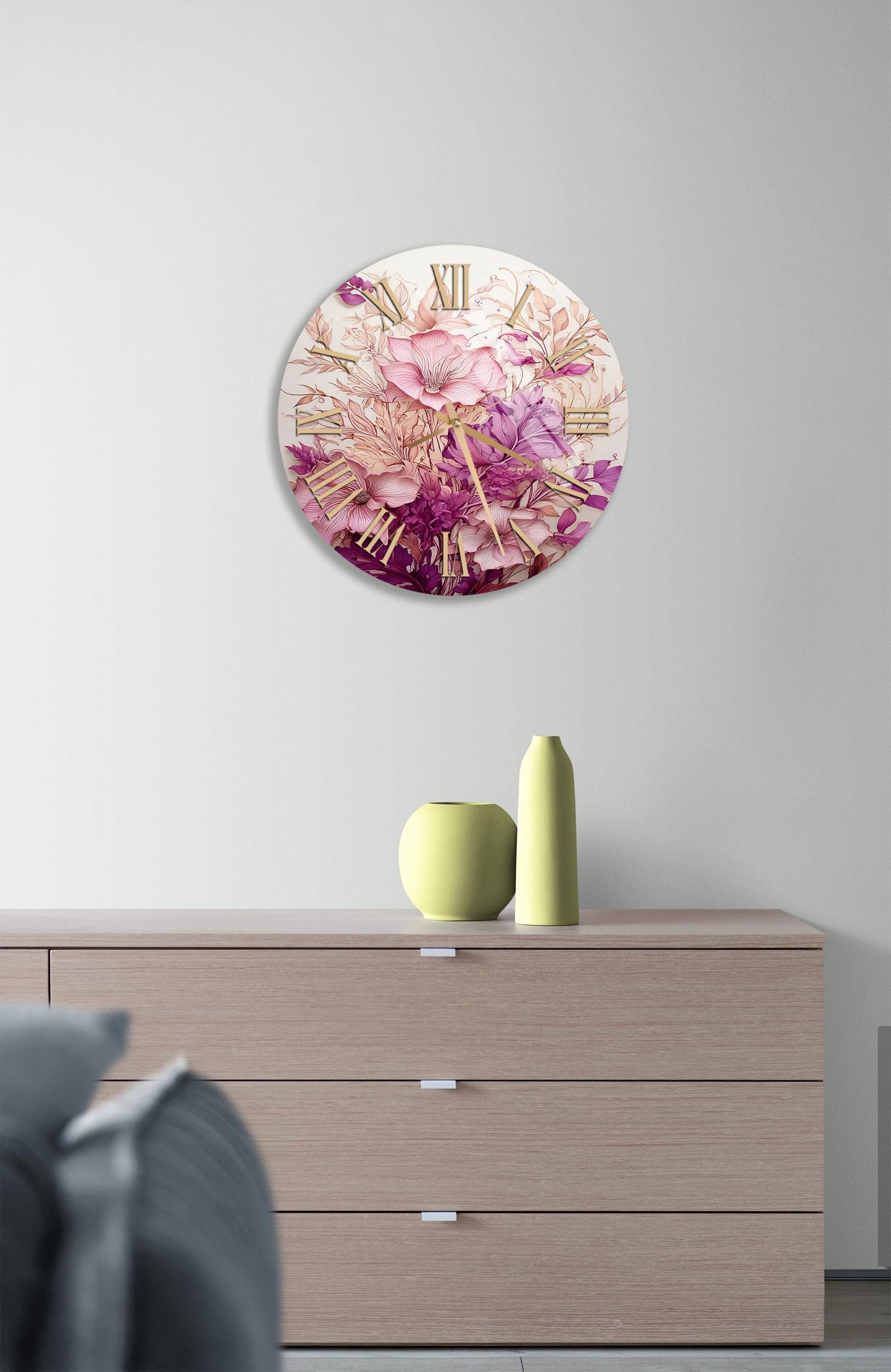 a clock on a wall above a dresser