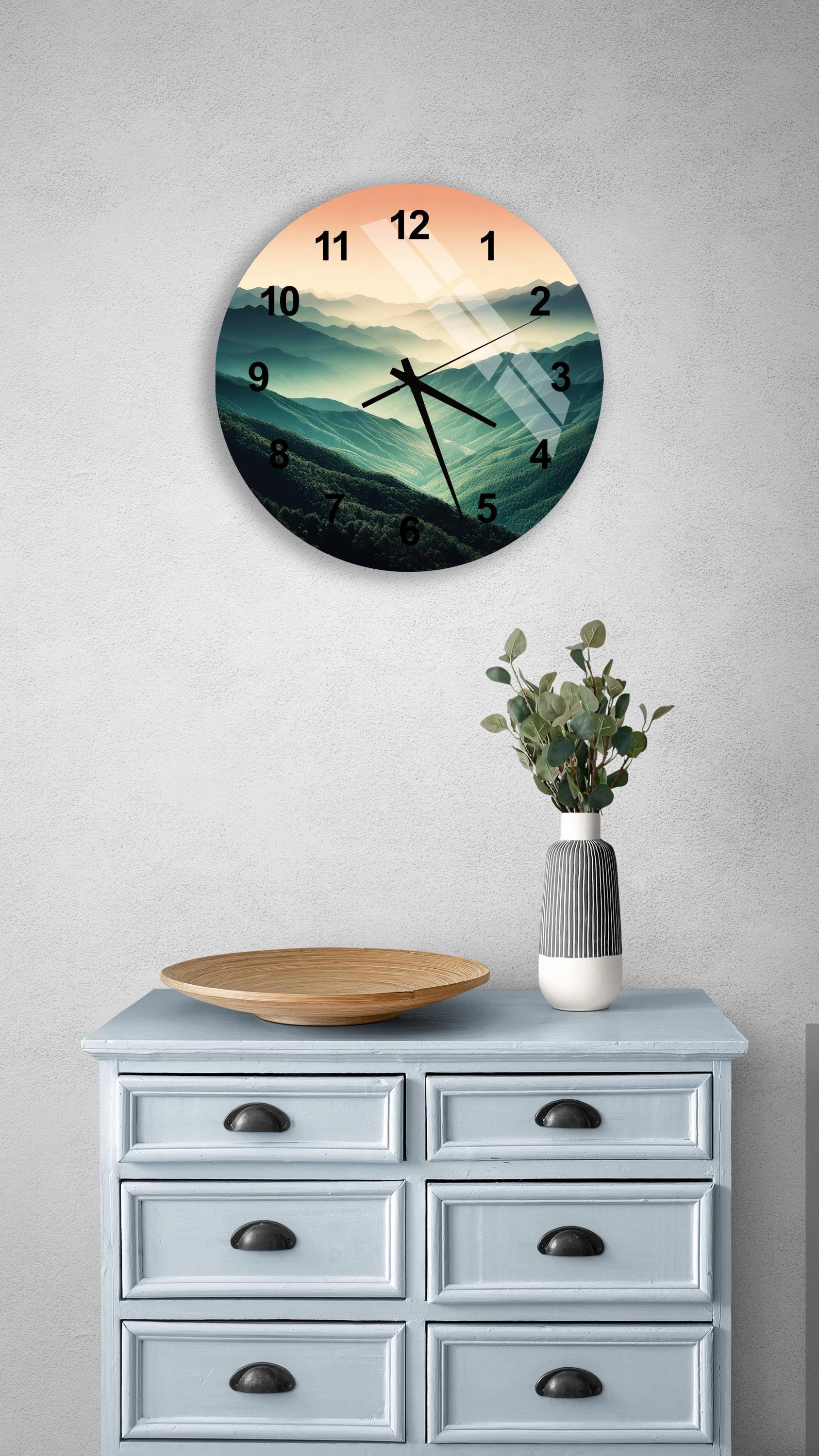 a clock on a wall above a dresser