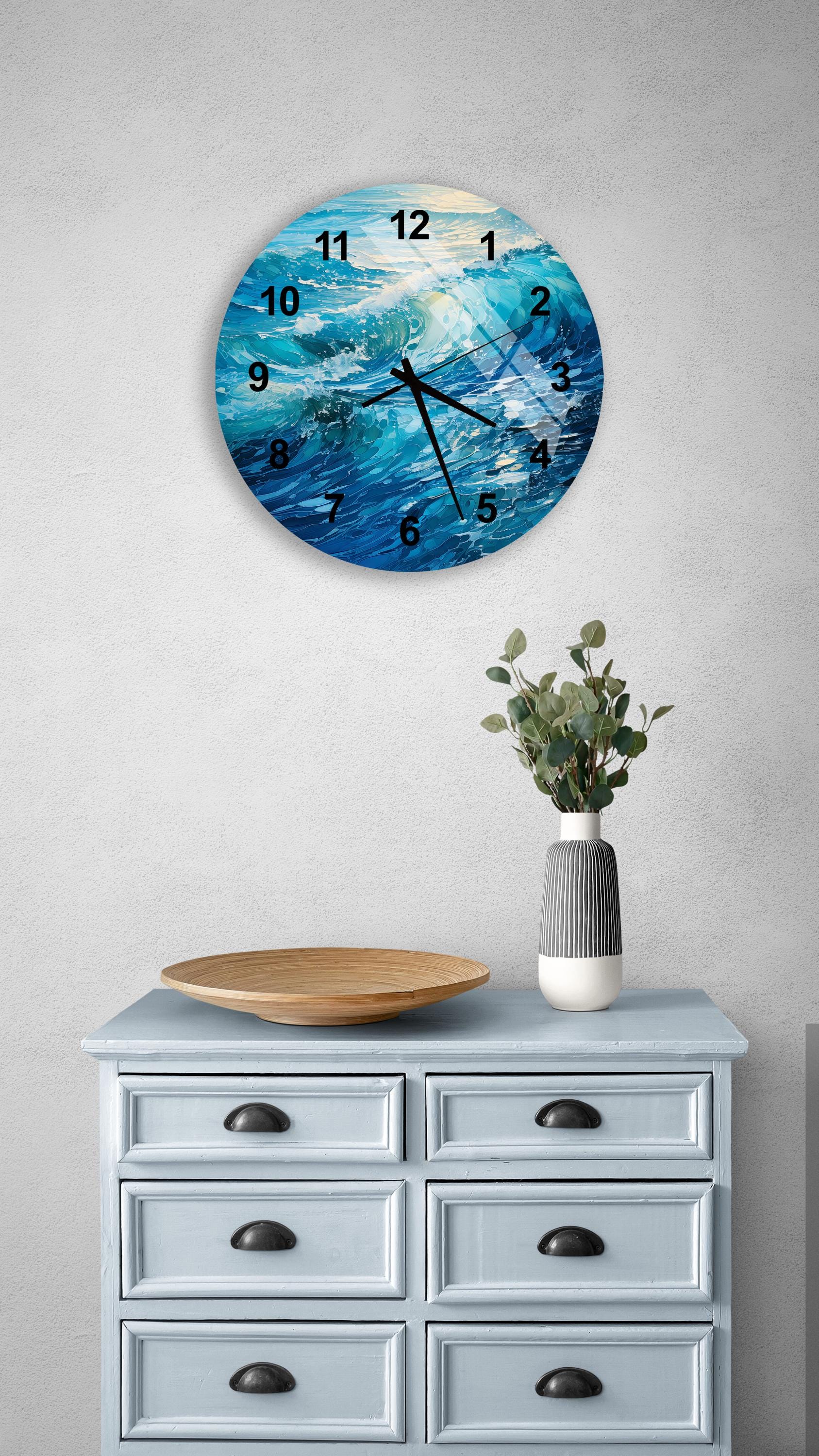a clock on a wall above a dresser