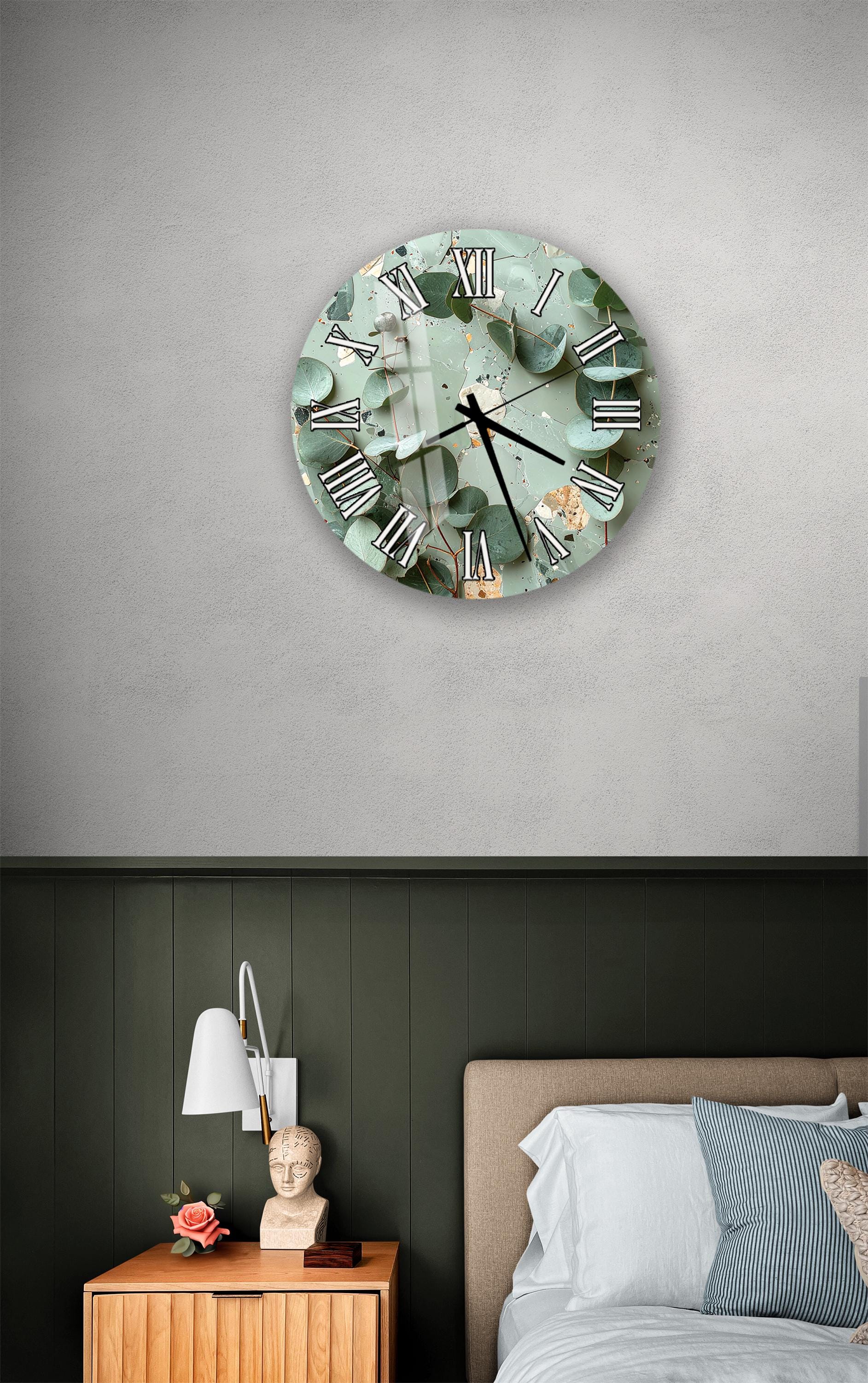 a bedroom setting with a wall clock, a nightstand, and a bed.