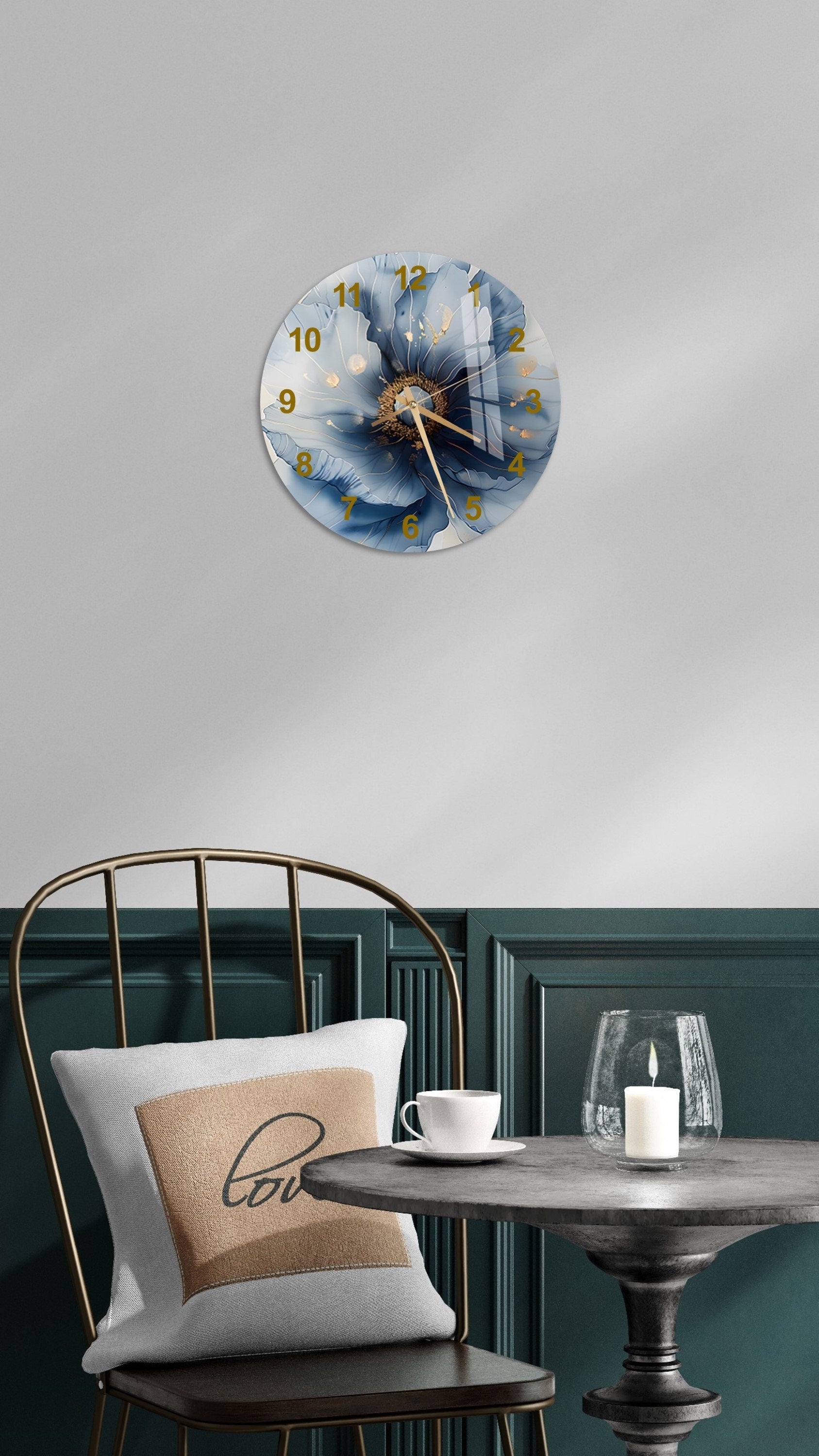 a clock that is on the wall above a table