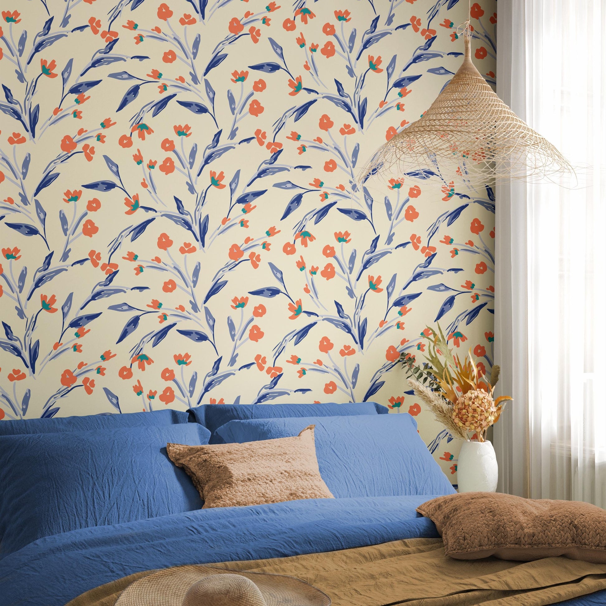 a bedroom with a blue bed, a decorative woven light fixture, and a vase of flowers on a nightstand.