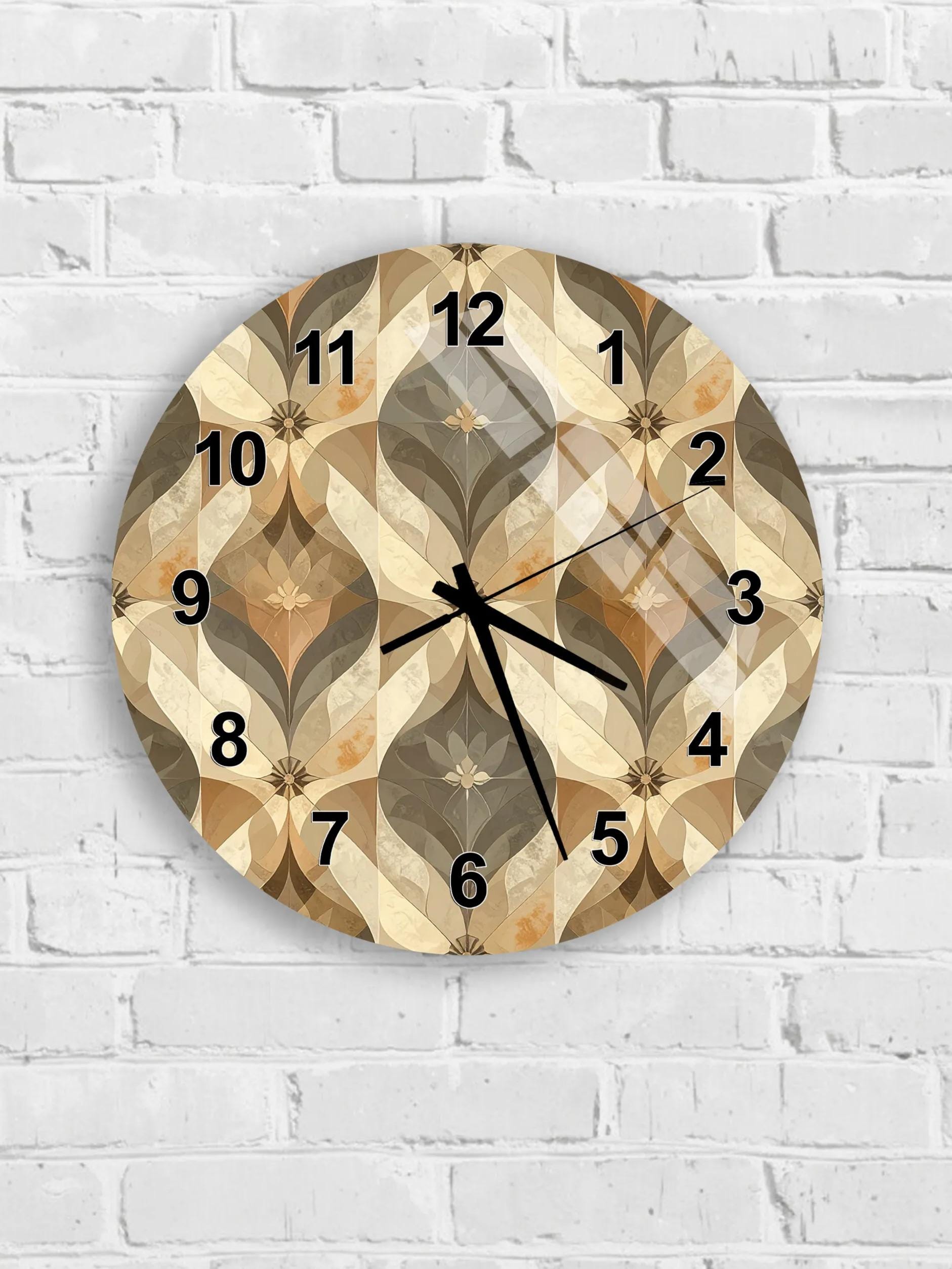 A round wall clock with a patterned design on a white brick wall.