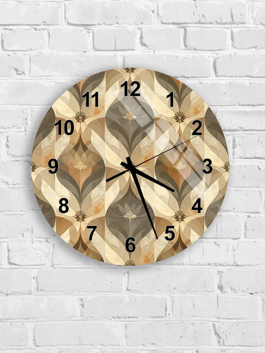 A round wall clock with a patterned design on a white brick wall.