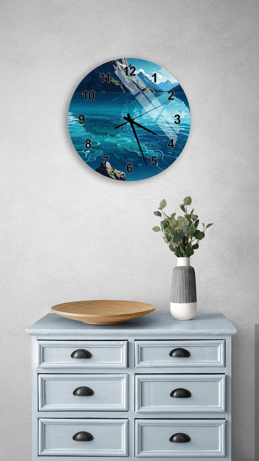 a wall clock with a blue ocean scene, a wooden plate, a vase with greenery, and a gray dresser with six drawers.