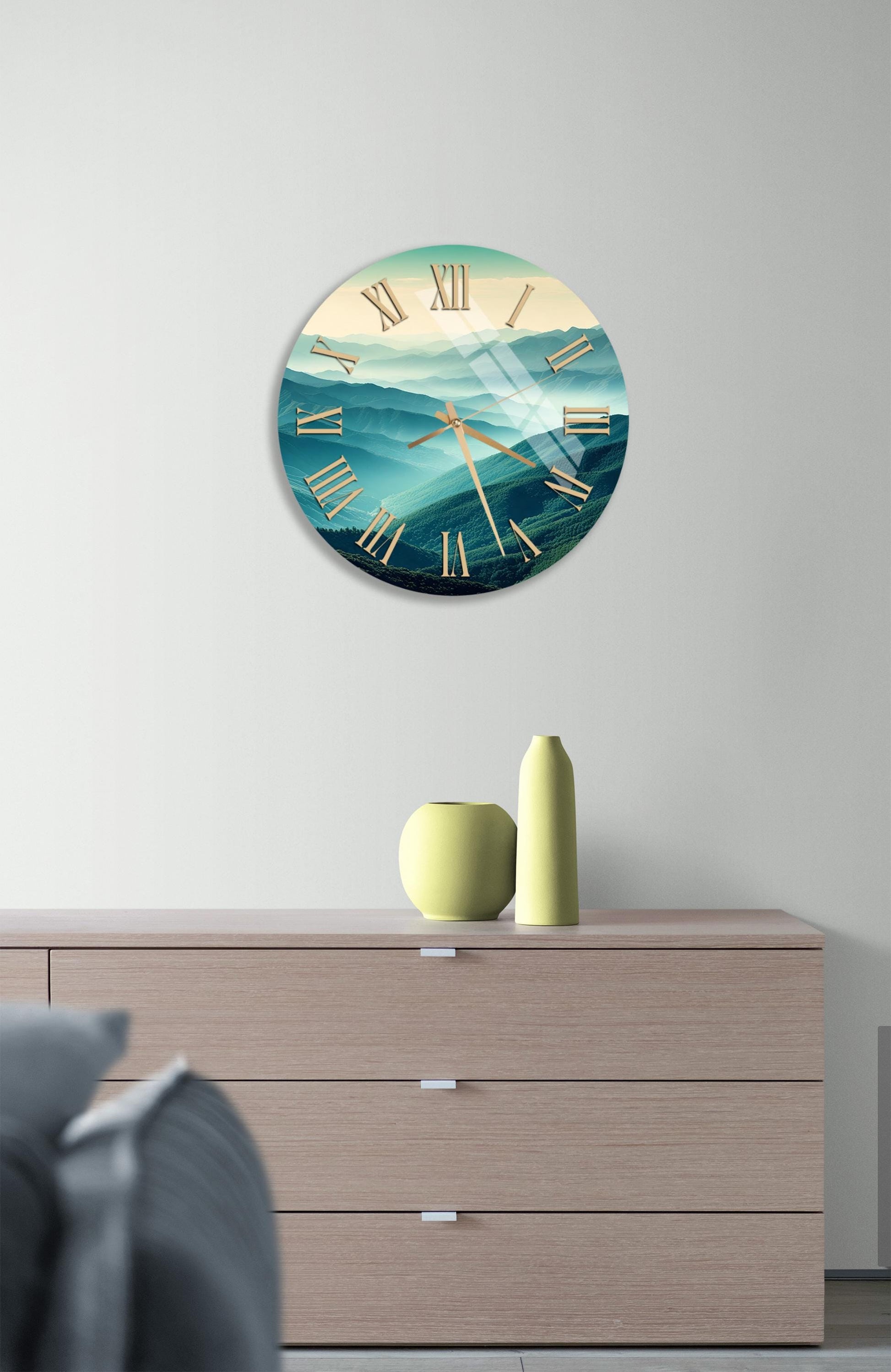 a clock on a wall above a dresser