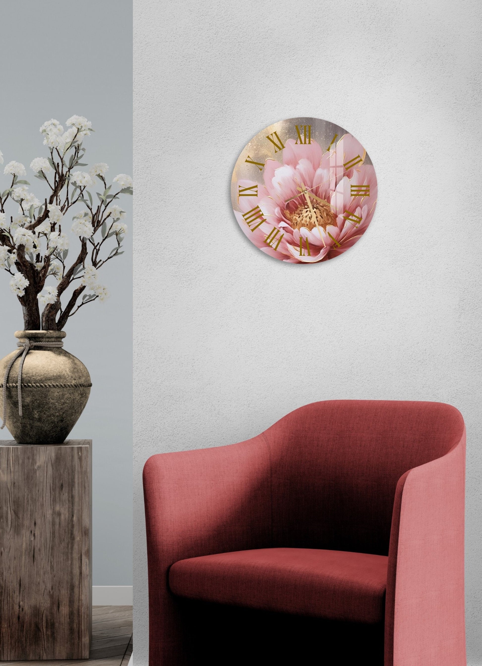 a red chair sitting next to a clock on a wall