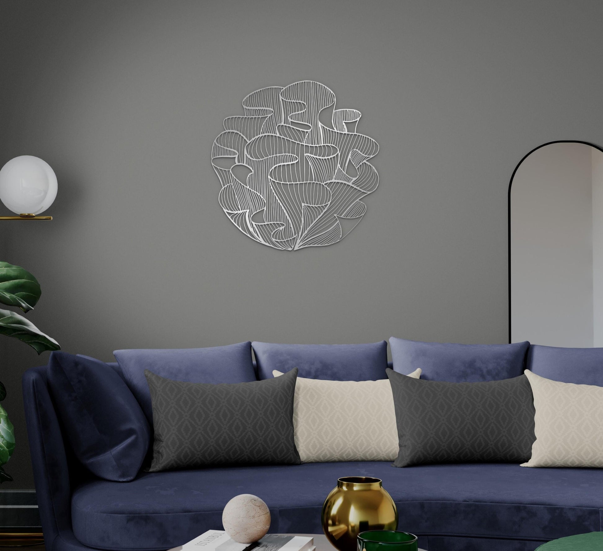 a living room with a blue couch and a mirror