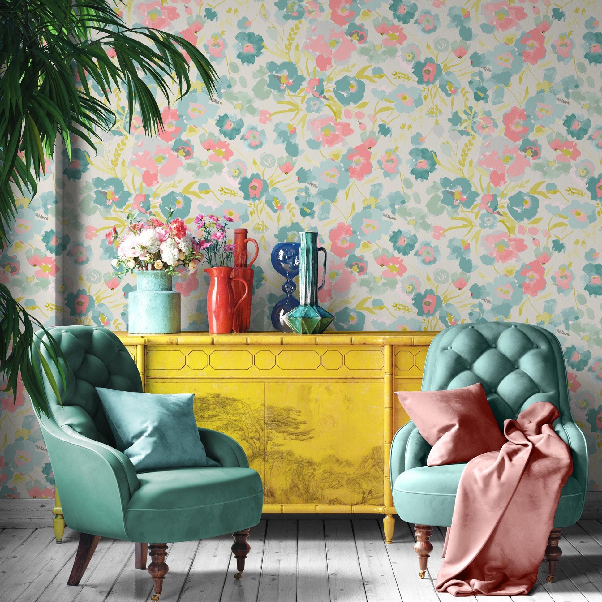 a vibrant and eclectic living space with a floral wallpaper, two green armchairs, a yellow cabinet, and various decorative elements such as vases and a potted plant.