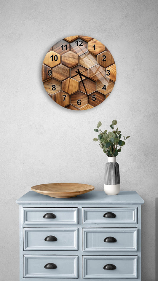 a wall clock with a wooden design, mounted on a wall above a light blue dresser with six drawers. The dresser also has a vase with greenery on it, and there is a wooden plate on the dresser.