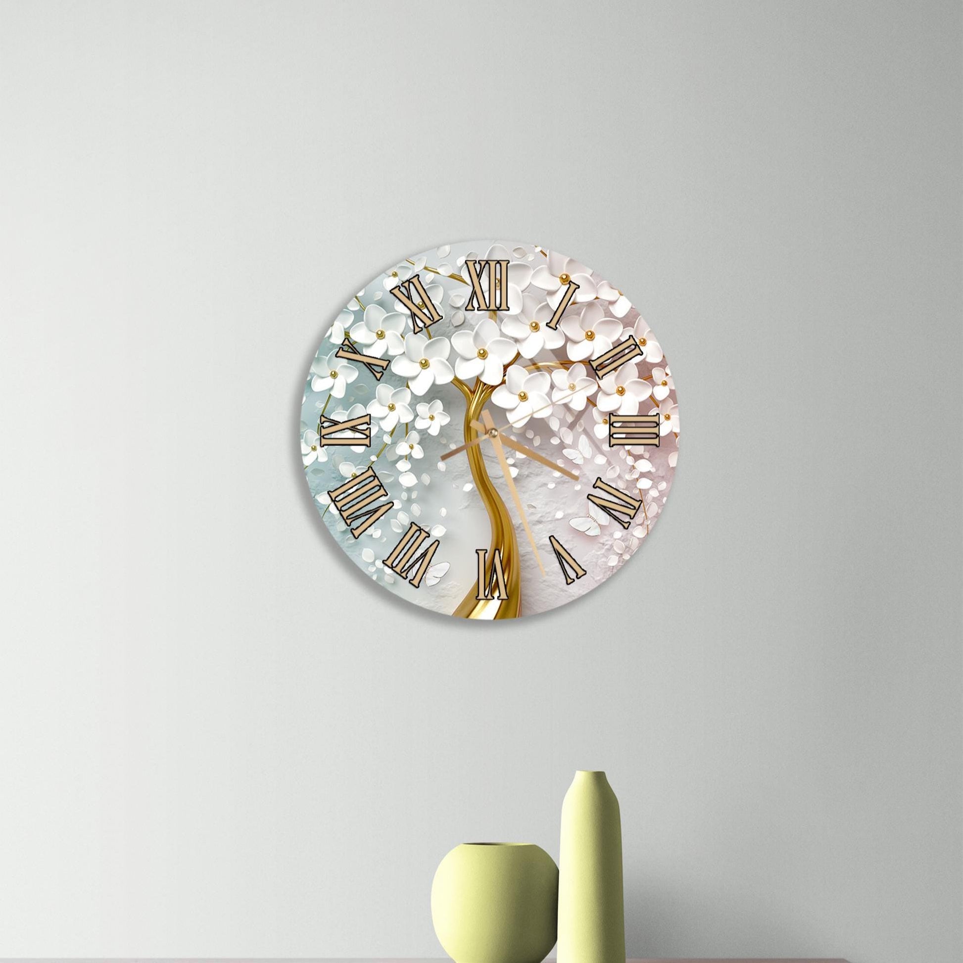 a wall clock with a floral design, mounted on a wall above a wooden dresser with a vase and a small sculpture on top.