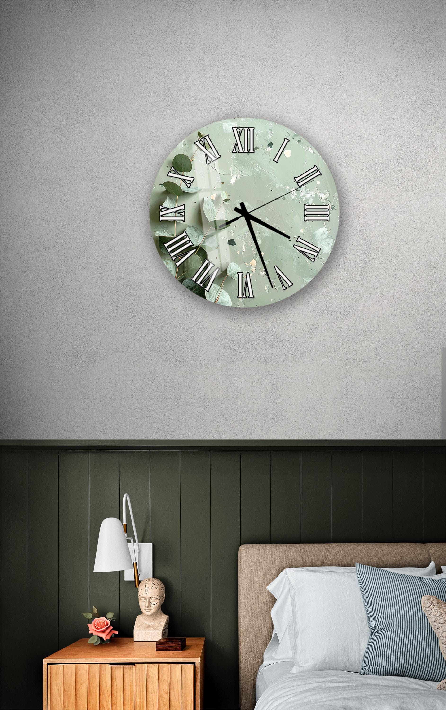 a bedroom setting with a wall clock, a nightstand, and a bed.