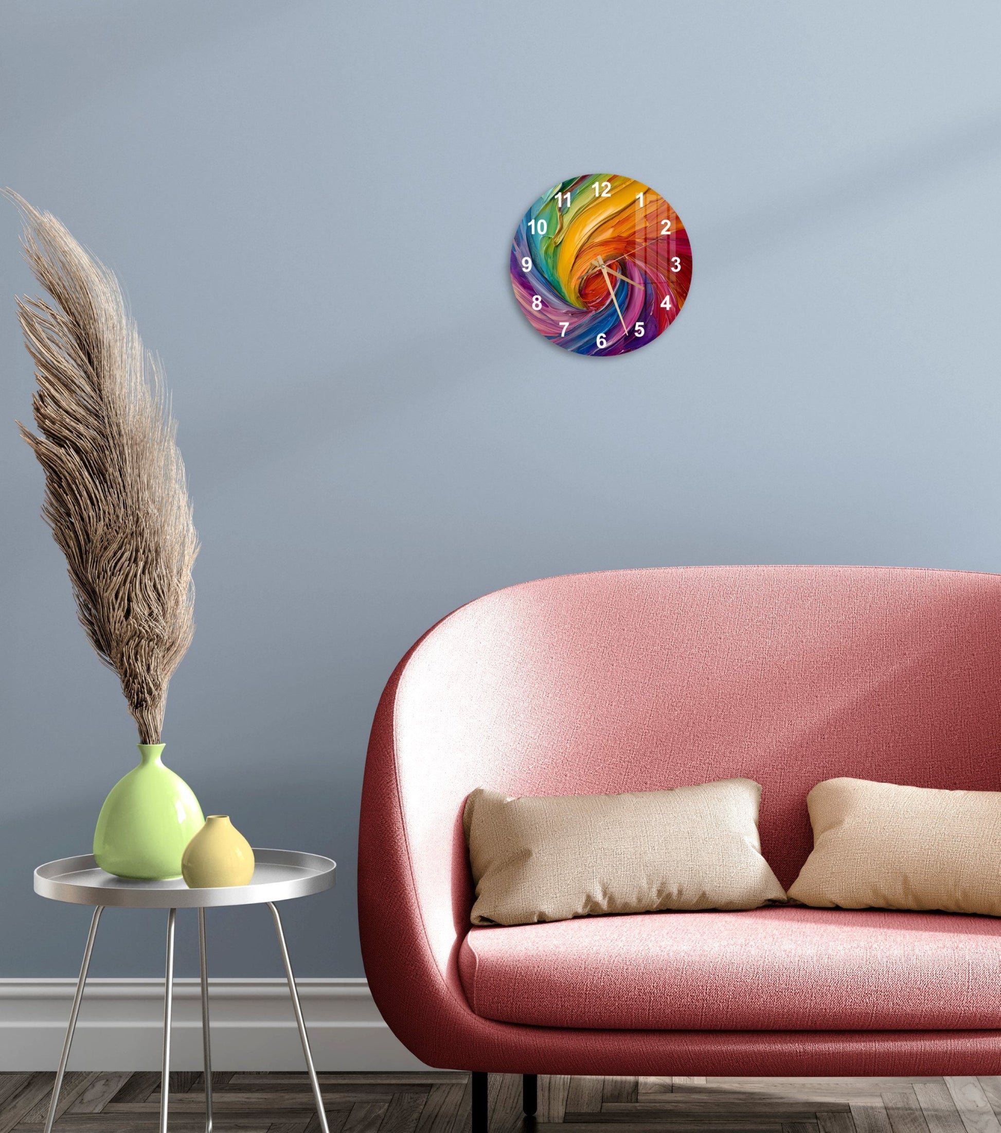 a living room with a pink couch and a clock on the wall