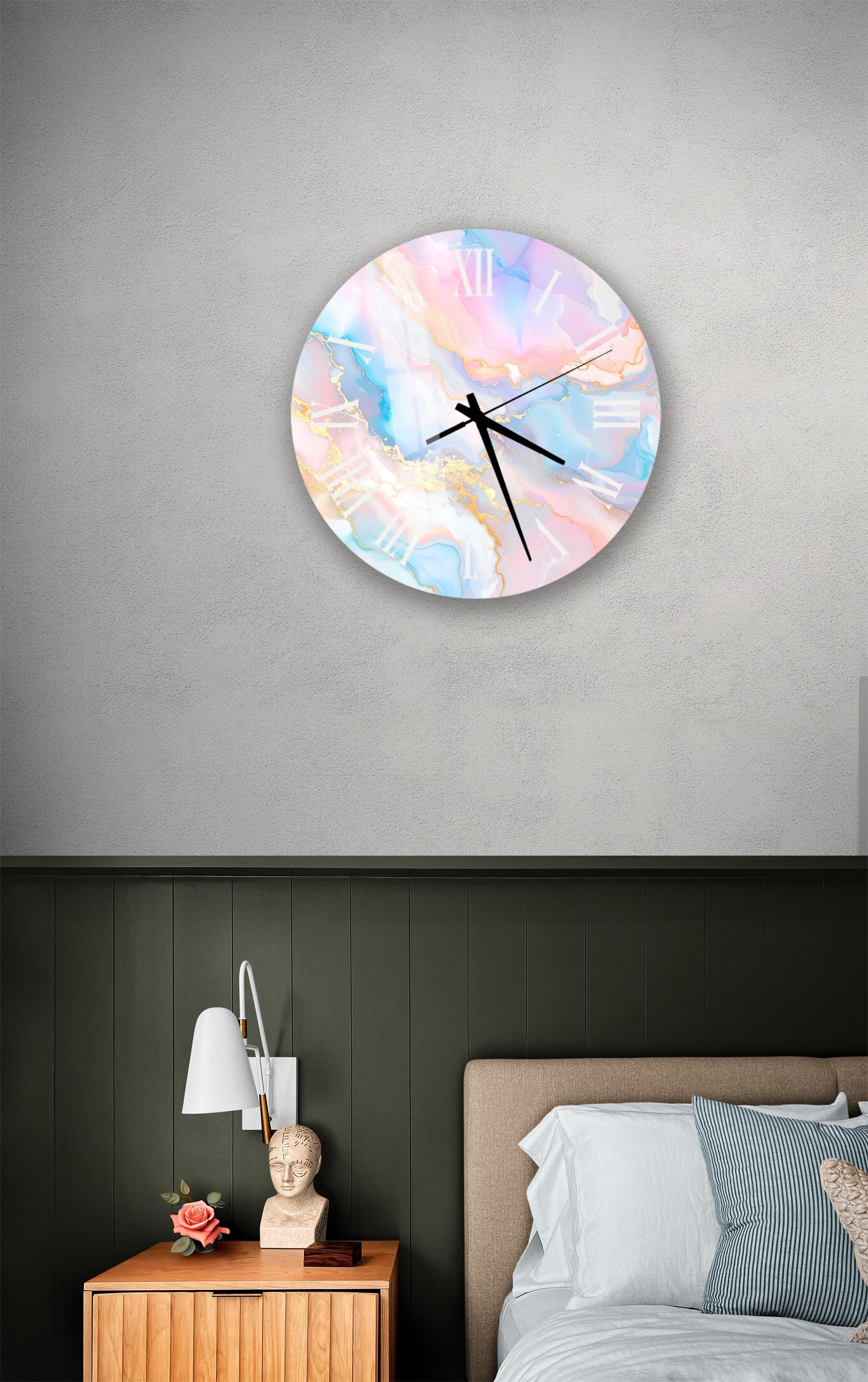 a bedroom setting with a wall clock, a nightstand, and a bed.