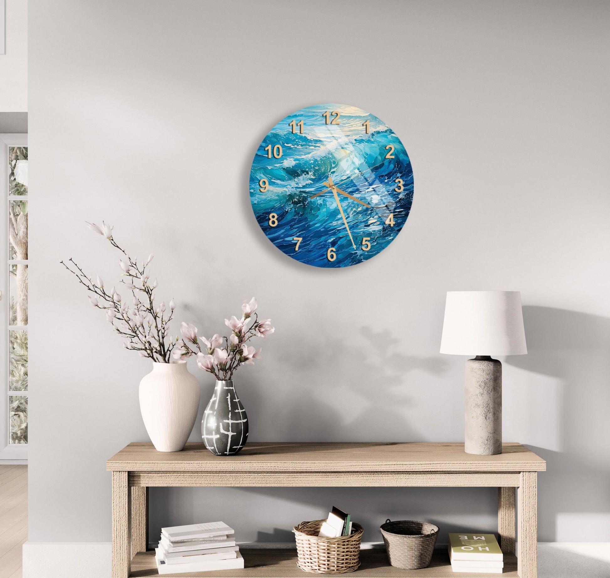 a clock on a wall above a table with a vase of flowers