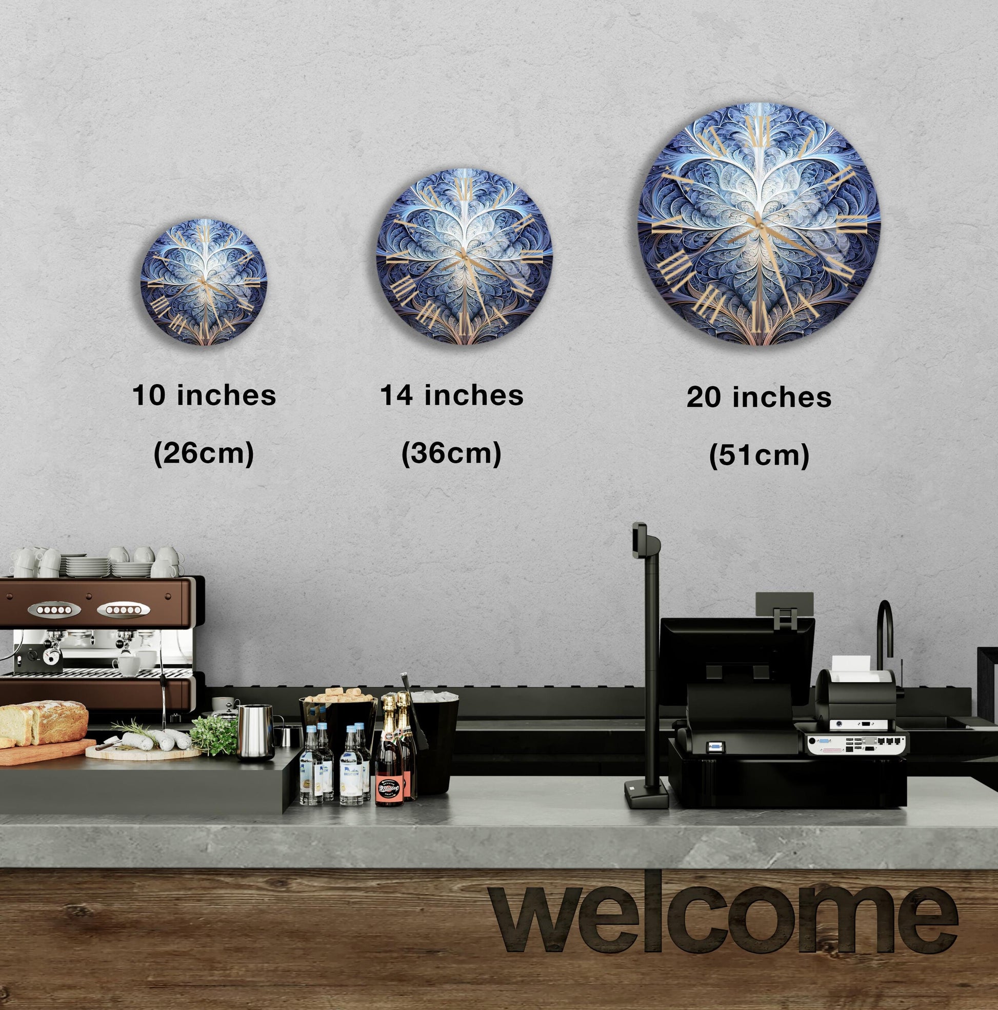 a kitchen counter with three clocks on the wall above it