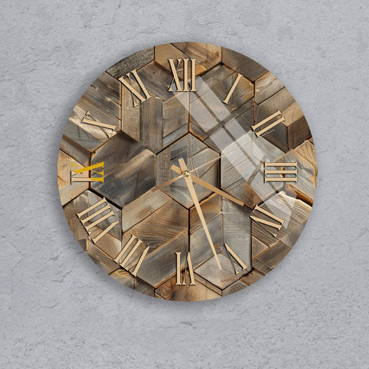 A round wooden clock with Roman numerals on its face, mounted on a concrete wall.