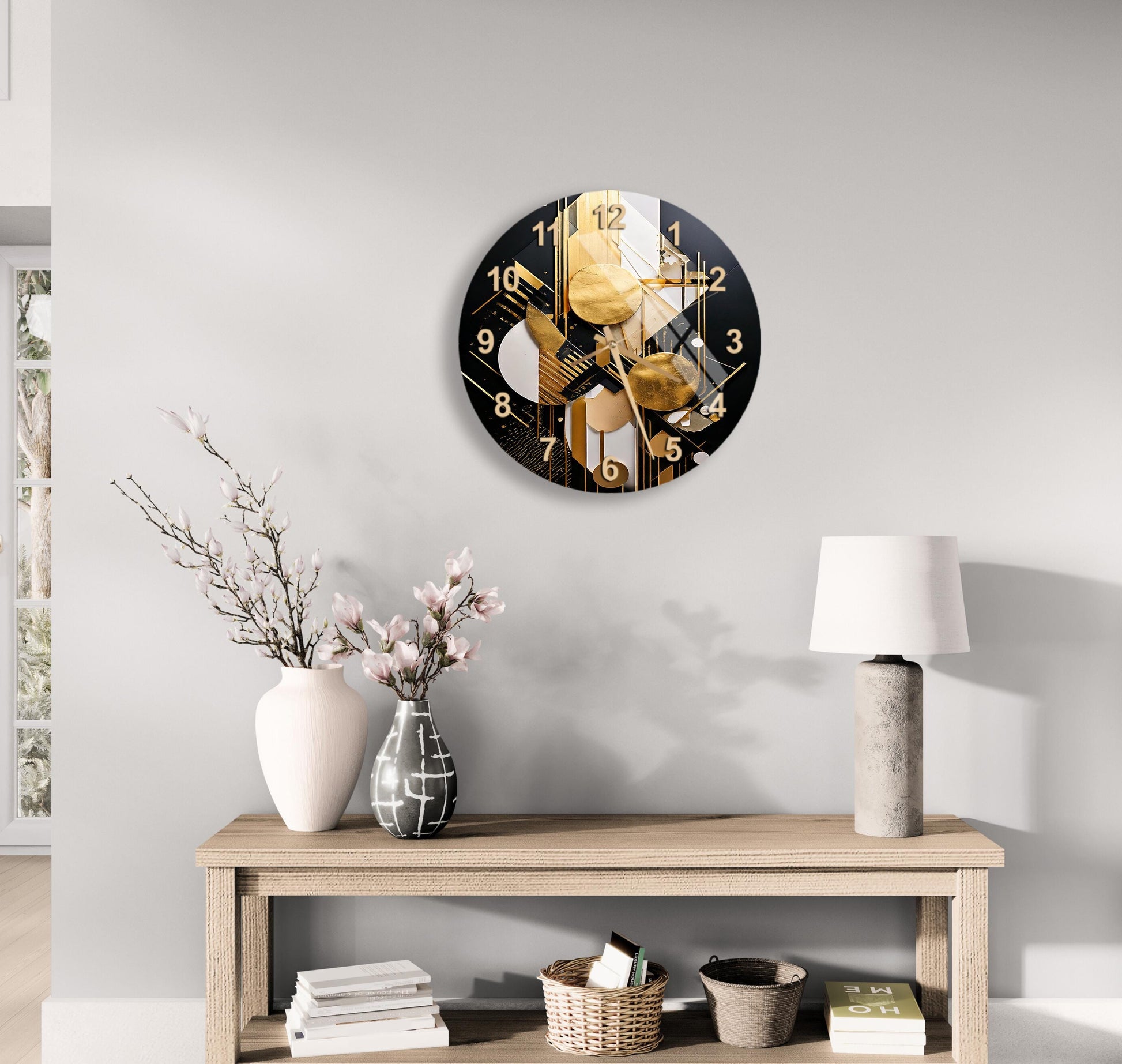 a clock on the wall above a table with a vase of flowers